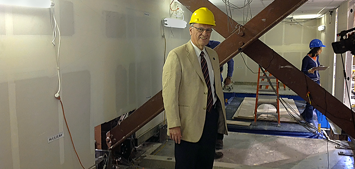 Manos Maragakis inside 2-story building in laboratory