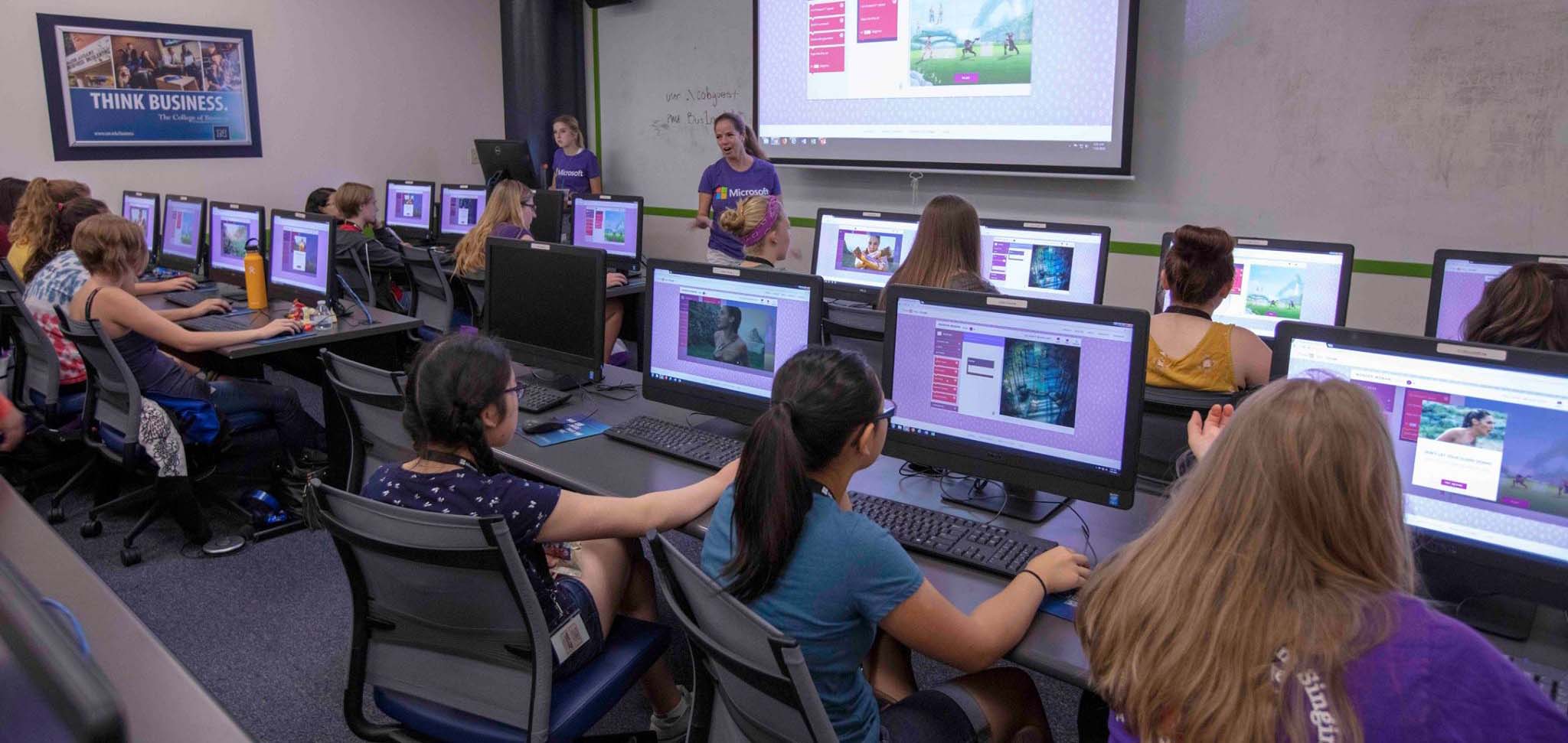 Students in classroom being taught how to code 