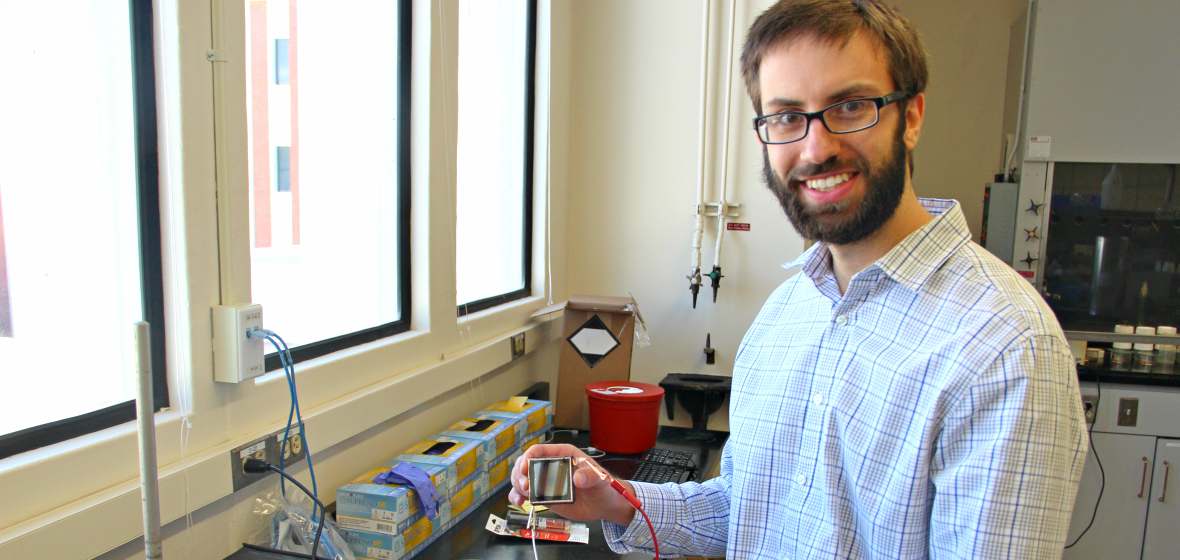 Christopher Barile working on smart window in lab