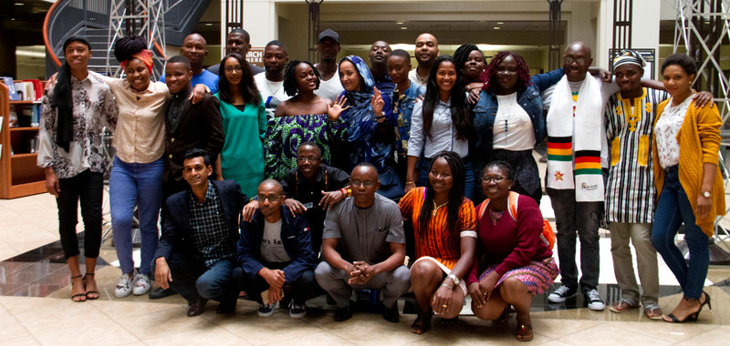 Mandela Fellows under the Reno Arch in the Mathewson-IGT Knowledge Center