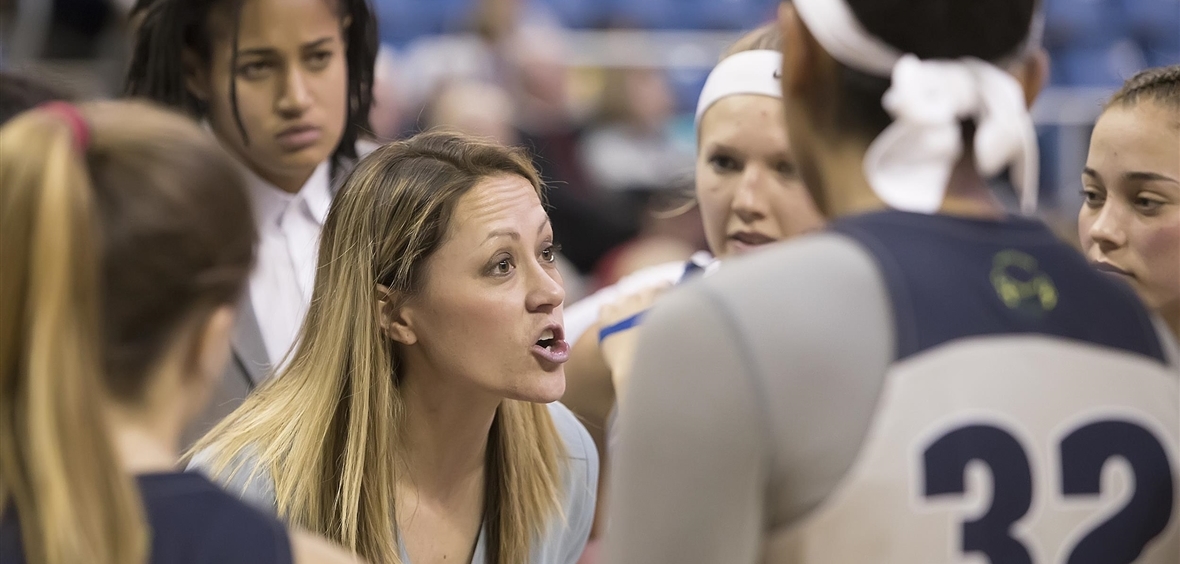 Coach Amanda Levens during a timeout at women hoop game