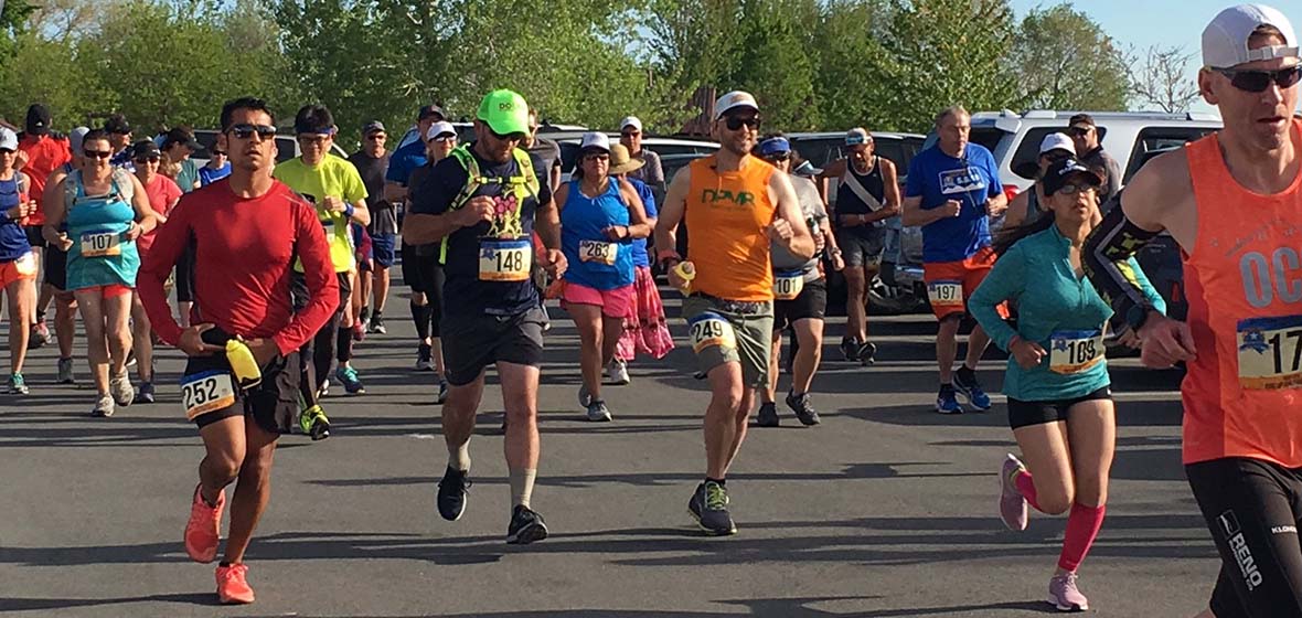 Runners leaving the starting line