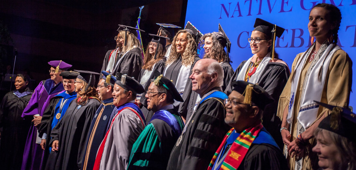 Graduates and faculty members gathered at the American Indian & Alaskan Native Graduate Celebration