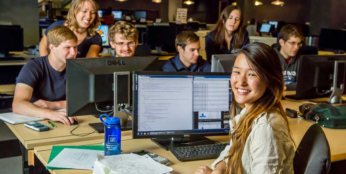 A group of students working on computers.