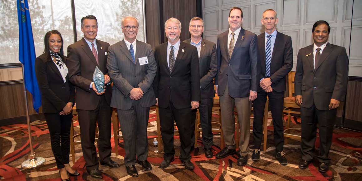 A group of Nevada leaders with Governor Brian Sandoval and NWIC.