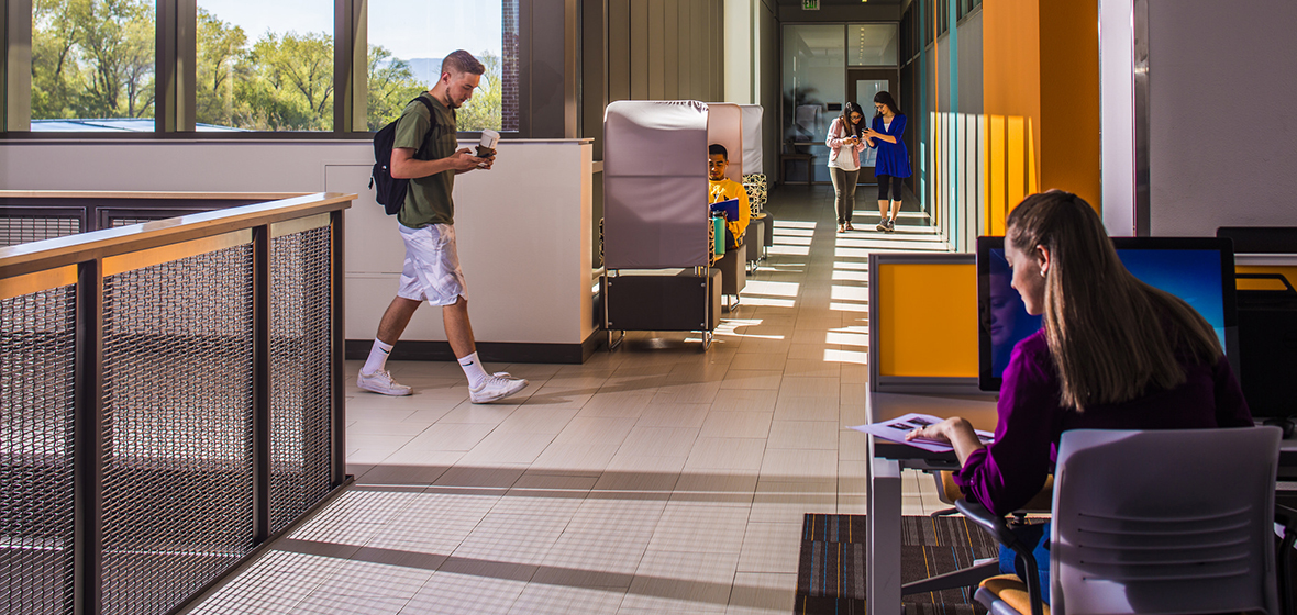 Students moving around the second floor of the Pennington Student Achievement Center. 