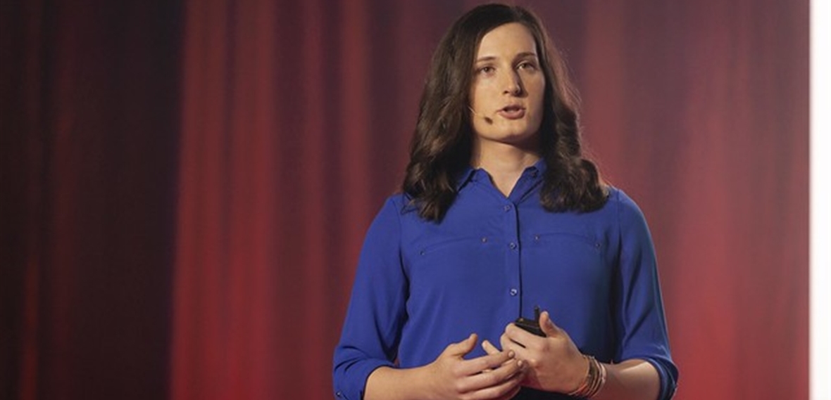 Jenna Weiner wearing headset at TEDx talk