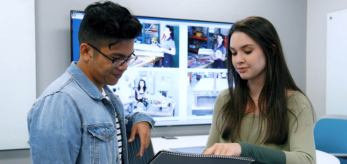 Two students working in the Ozmen Center for Entrepreneurship