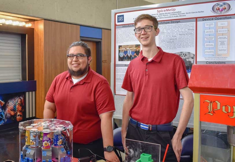 Two students presenting a project.