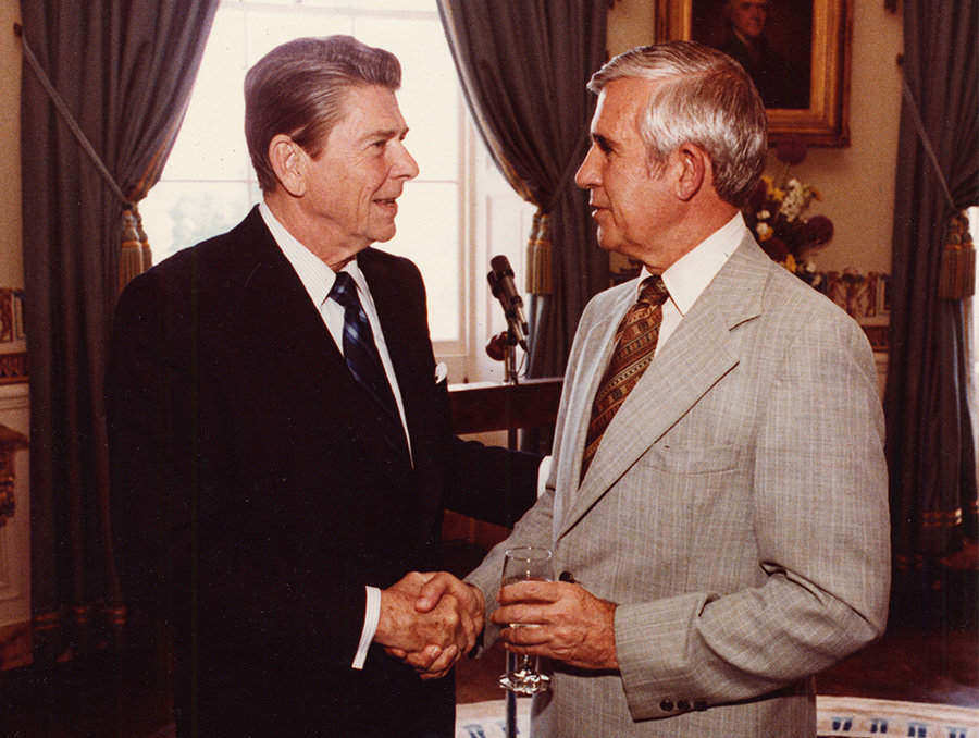 Ronald Reagan and Paul Laxalt shaking hands