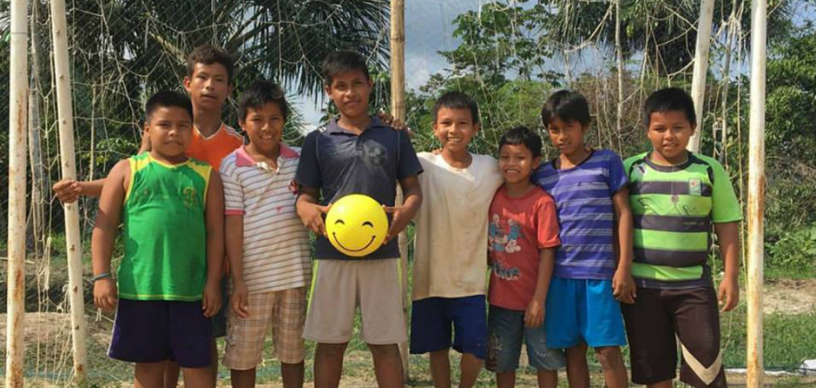 Children in Peru with their play happy ball