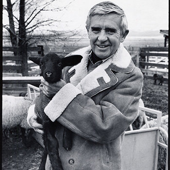 Paul Laxalt holds a black lamb