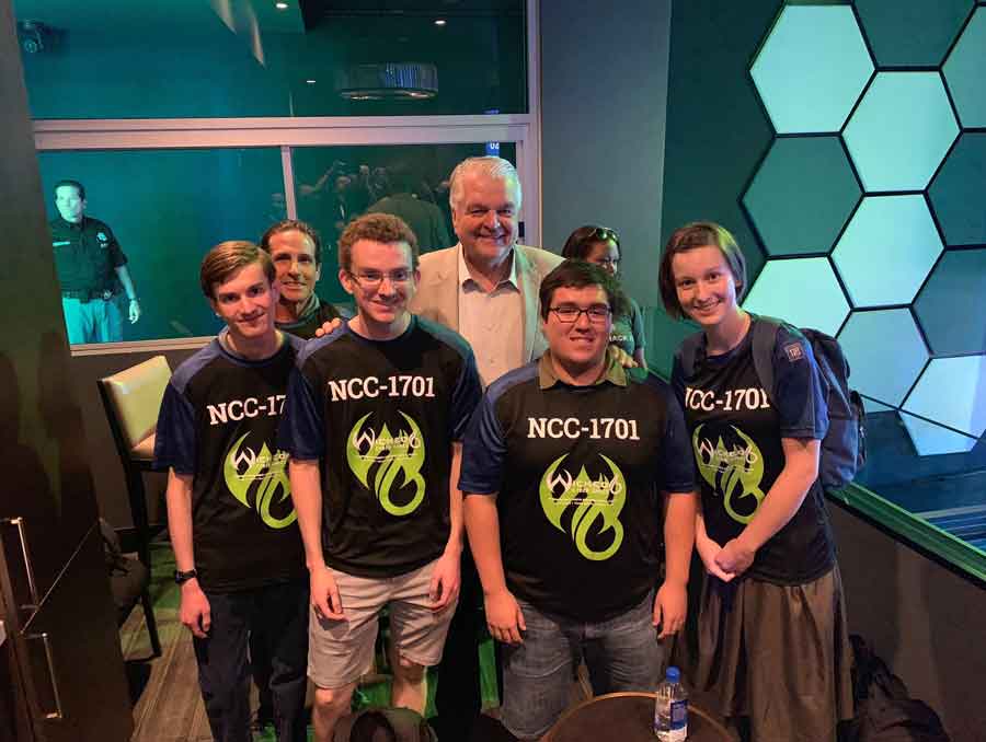 The club posing together for a photo with the governor. From left to right: Bryson Lingenfelter, coach Bill Doherty, Ian Grant, Govenor Steve Sisolak, Ignacio Astaburuaga and Jamie Poston.