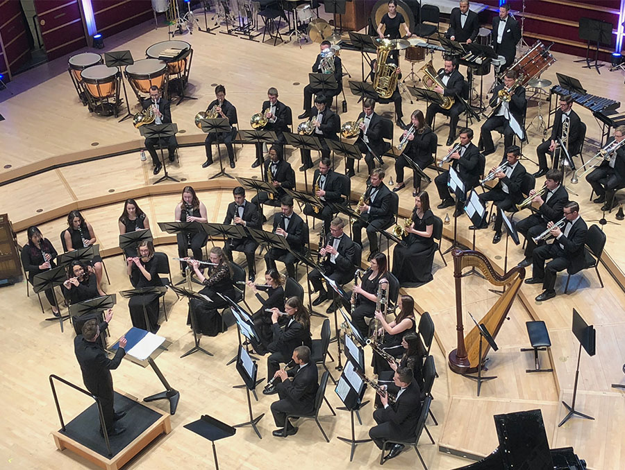 Nevada Wind Ensemble plays at 2018 College Band Directors National Association Division Conference .