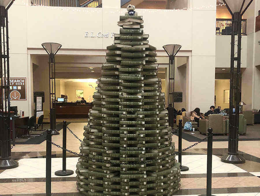 Holiday book tree located in the Mathewson-IGT Knowledge Center