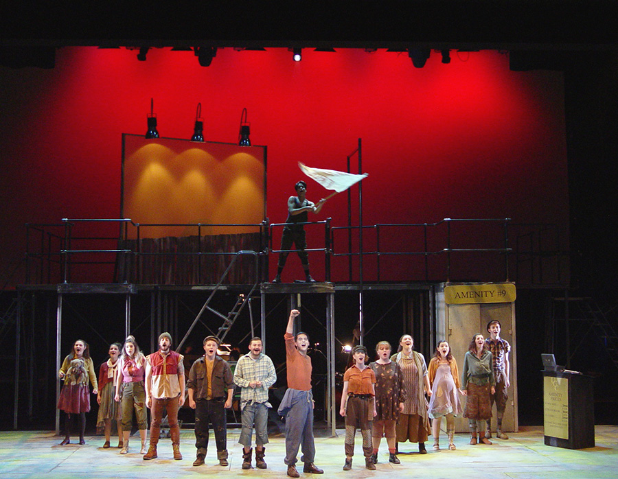 The cast of Urinetown performs