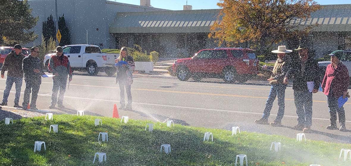 people watching a water audit