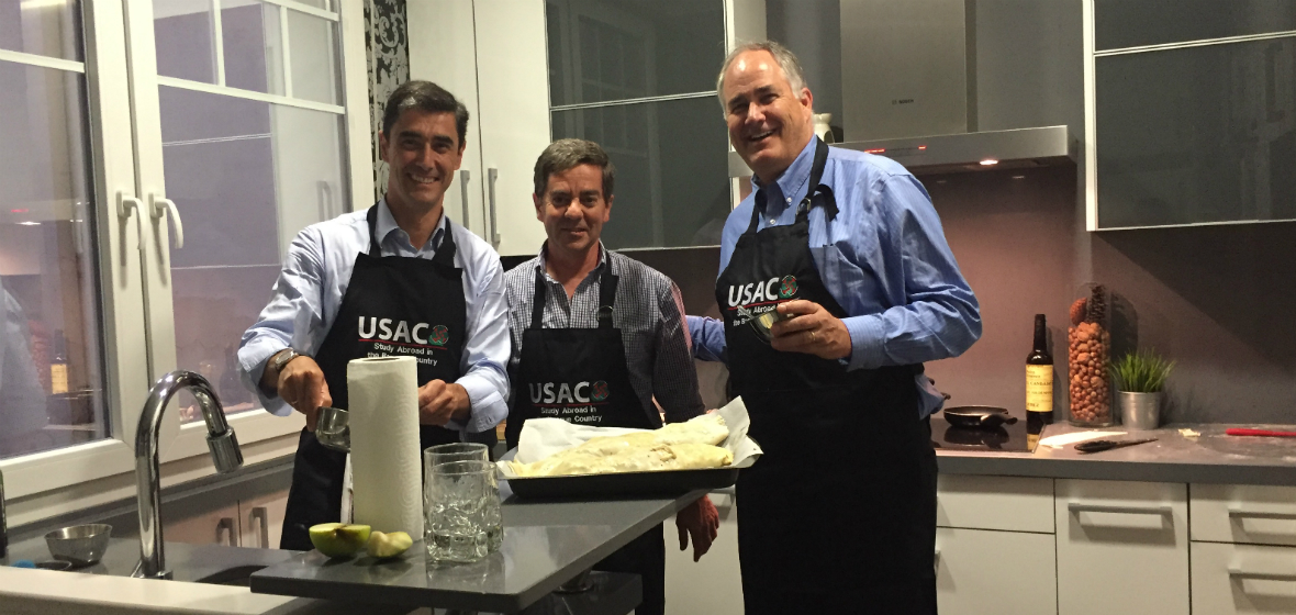 Three people in the USAC program cooking
