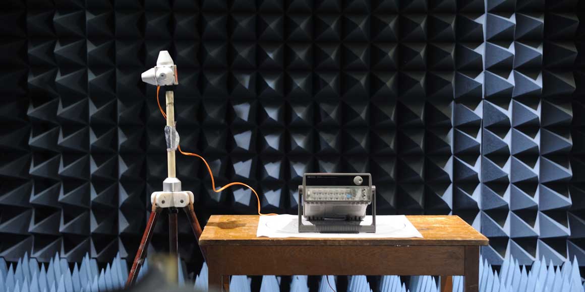 Interior shot of anechoic chamber with equipment set up.