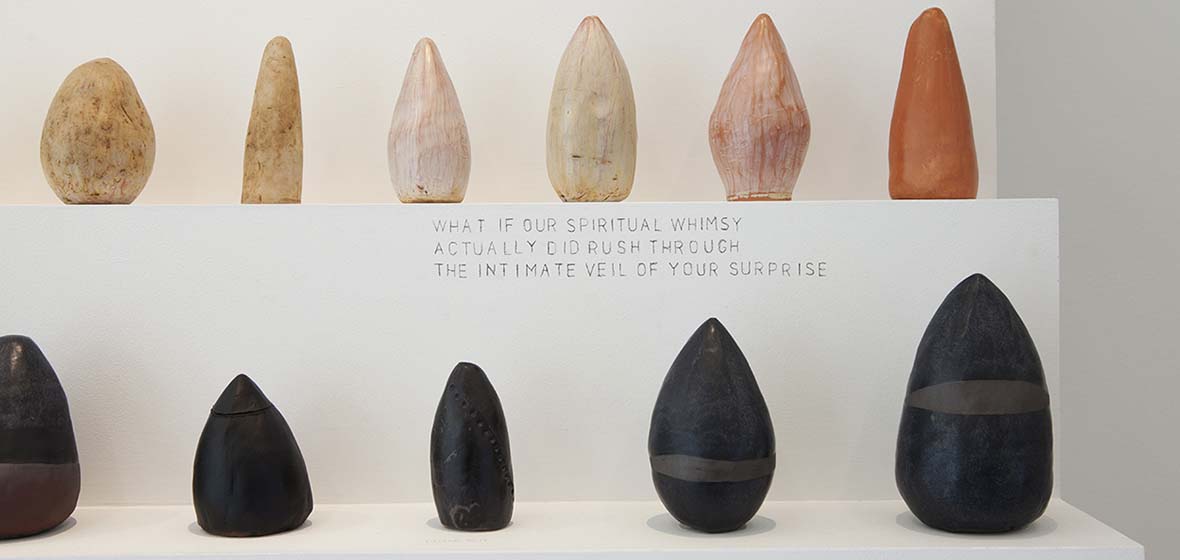 Sculptures from Sameer Farooq & Jared Stanley's "Terma, Images from the Ear or Groin or Somewhere". The words "What if our spiritual whimsy actually did rush through the intimate veil of your surprise."