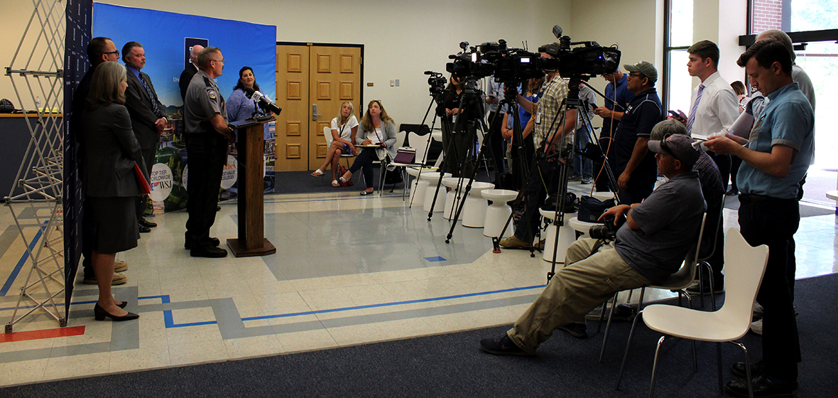 Members of the media interviewing University officials