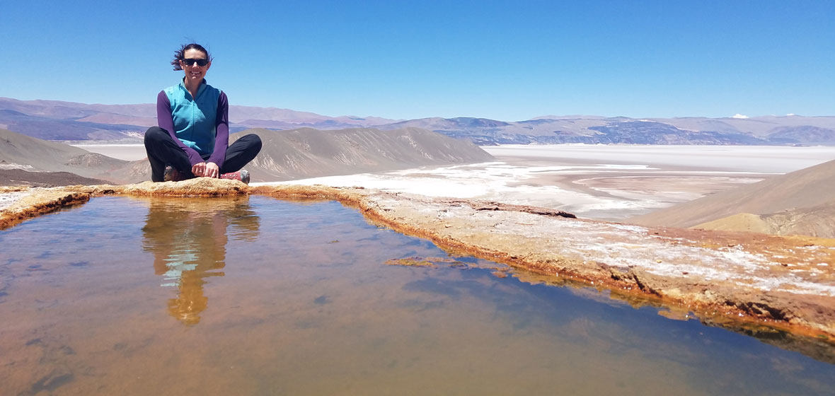 Karen Lloyd near a small body of water.