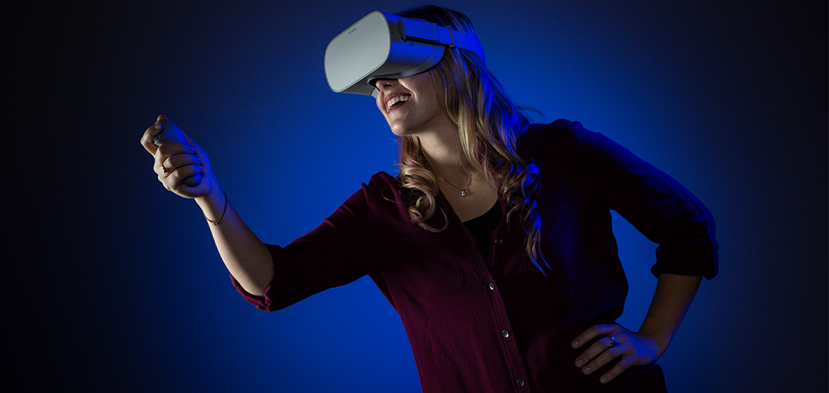 Multimedia Production Specialist Michelle Rebaleati teleports herself to a different environment using virtual reality 