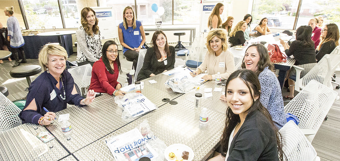 Female entrepreneurs sit around a table at the Innevation Center