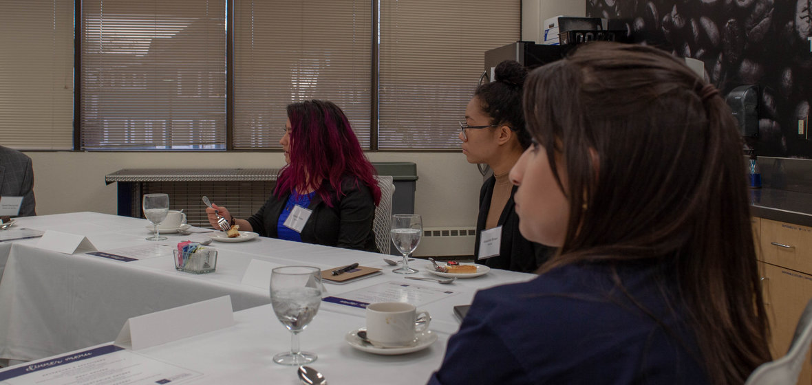 Students listening to a presentation of interview strategies. 