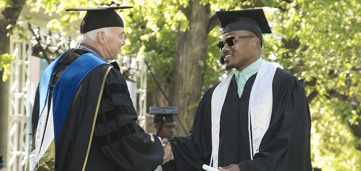 President Marc Johnson and Malik Reed