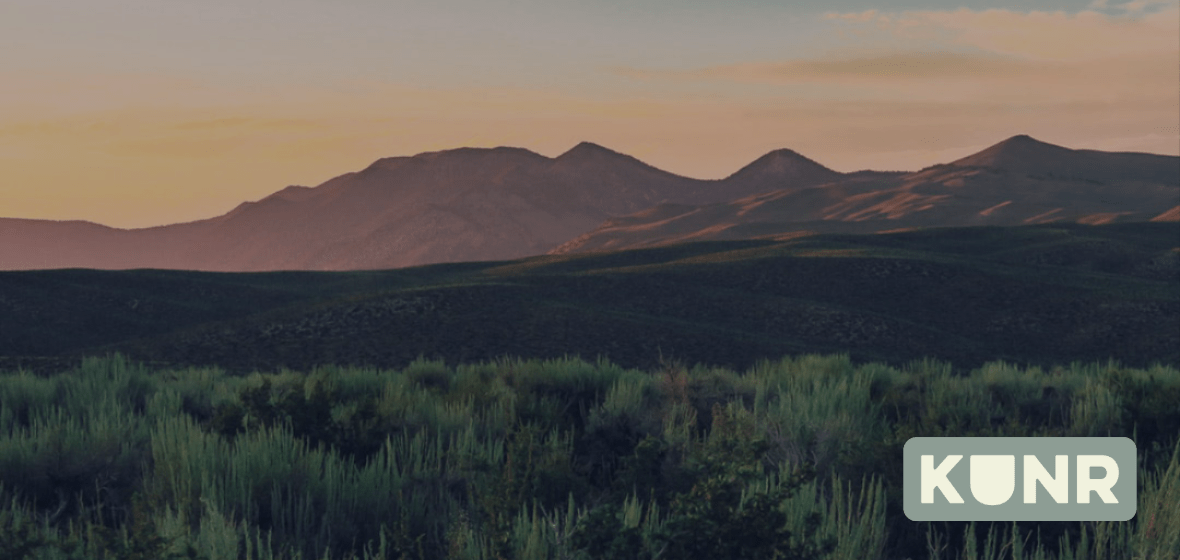 Mountains and a skyline with a KUNR logo in the right-hand corner.