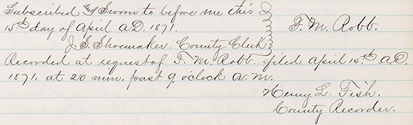 Sample of a handwritten cursive county recorder entry.