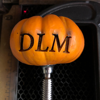 DLM engraved on pumpkin