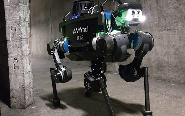 Ground robot ANYMAL of the CERBERUS team walks through a cement tunnel