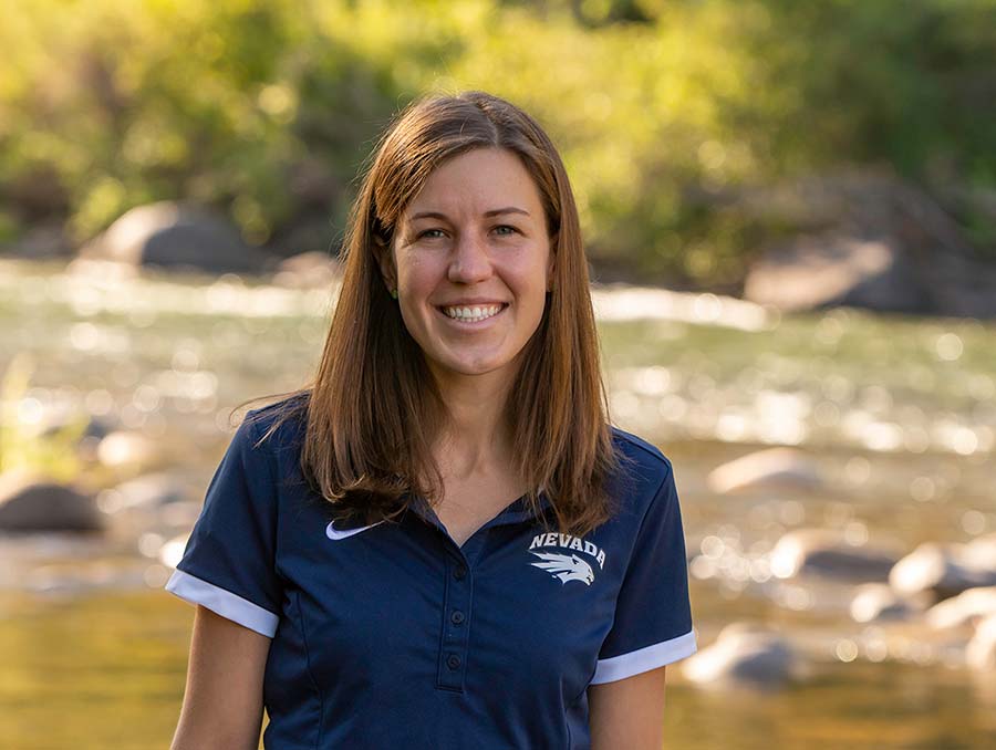 Joanna Blaszczak smiling with a river running in the background