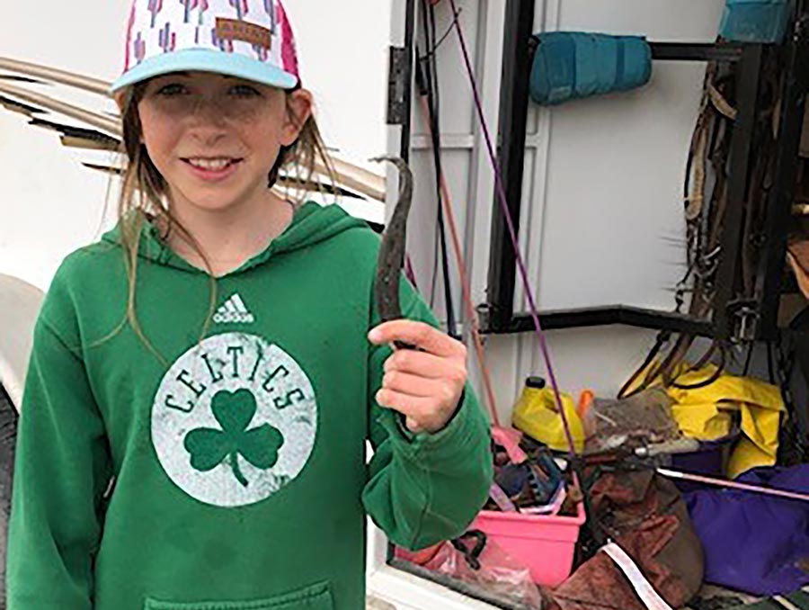 Hannah posing with hoof pick