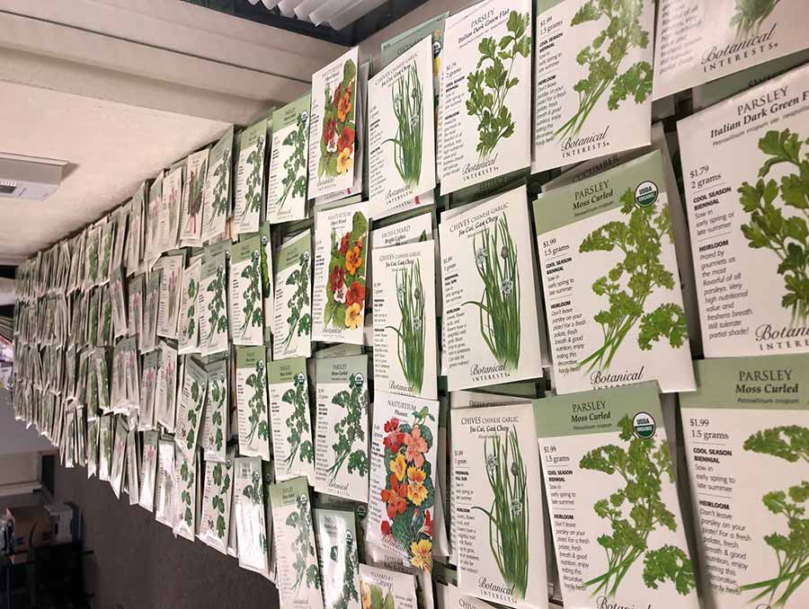 Seed packets displayed on wall