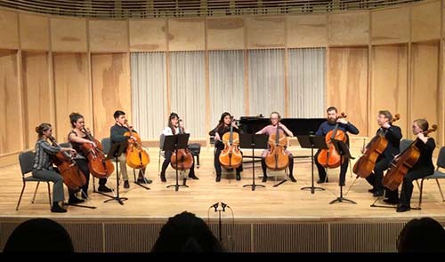 Kara Bainter (left) performing at the cello studio winter recital in 2019. 