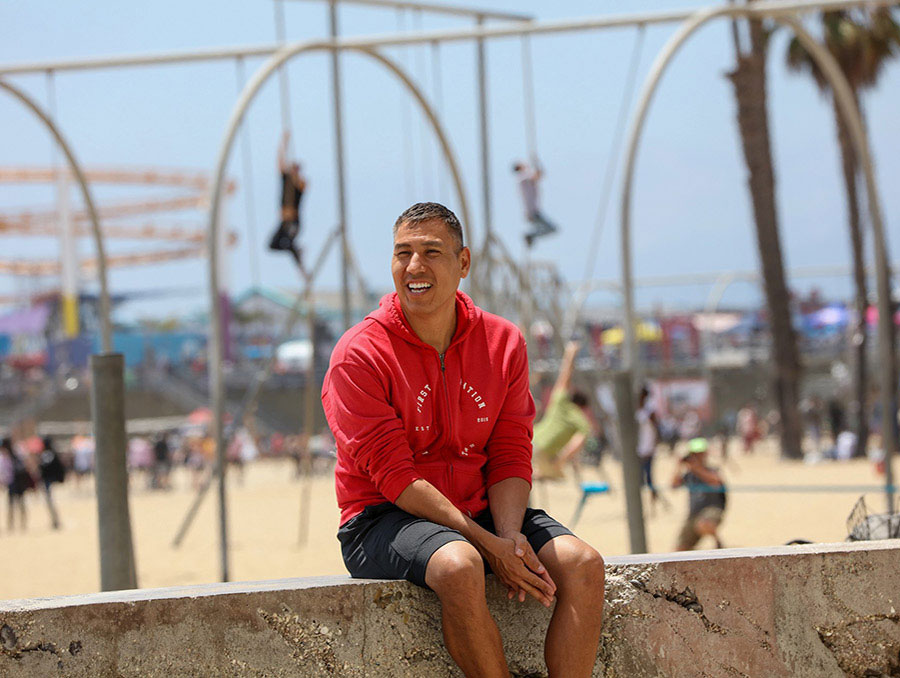 Dr. Myrton Running sits on the beach in Santa Monica. 