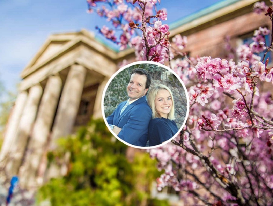 Spring blooms in front of the Mackay Building with a photo of Steve Maples and his daughter in the middle.