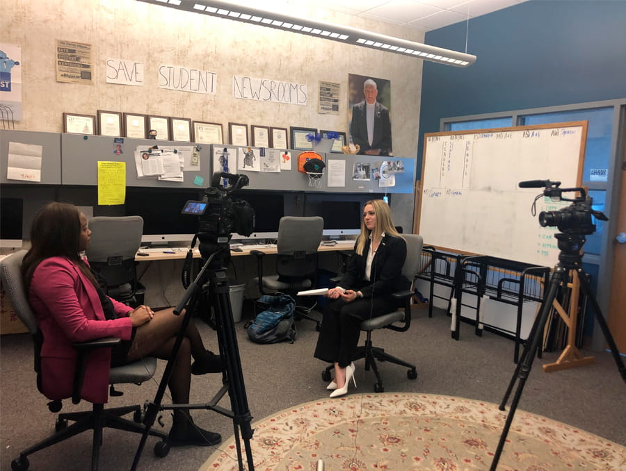 Student reporter from the Nevada Sagebrush interviews ASUN President Dominique Hall.