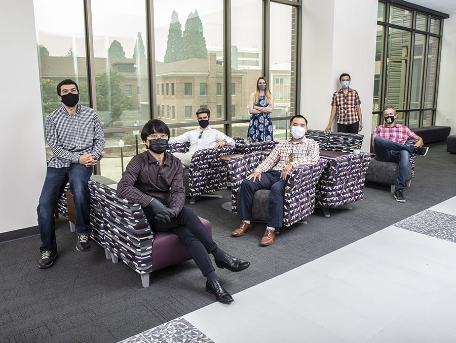 faculty on chairs in the William N. Pennington Engineering Building