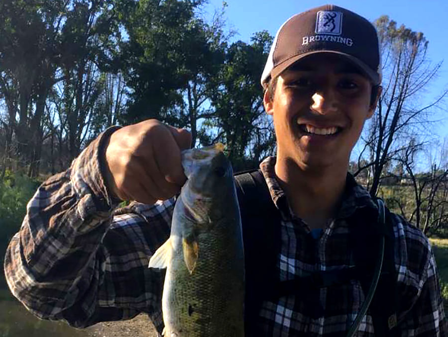 person holding fish