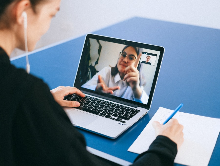 Photo by Anna Shvets from Pexels of a woman on a video call with an instructor
