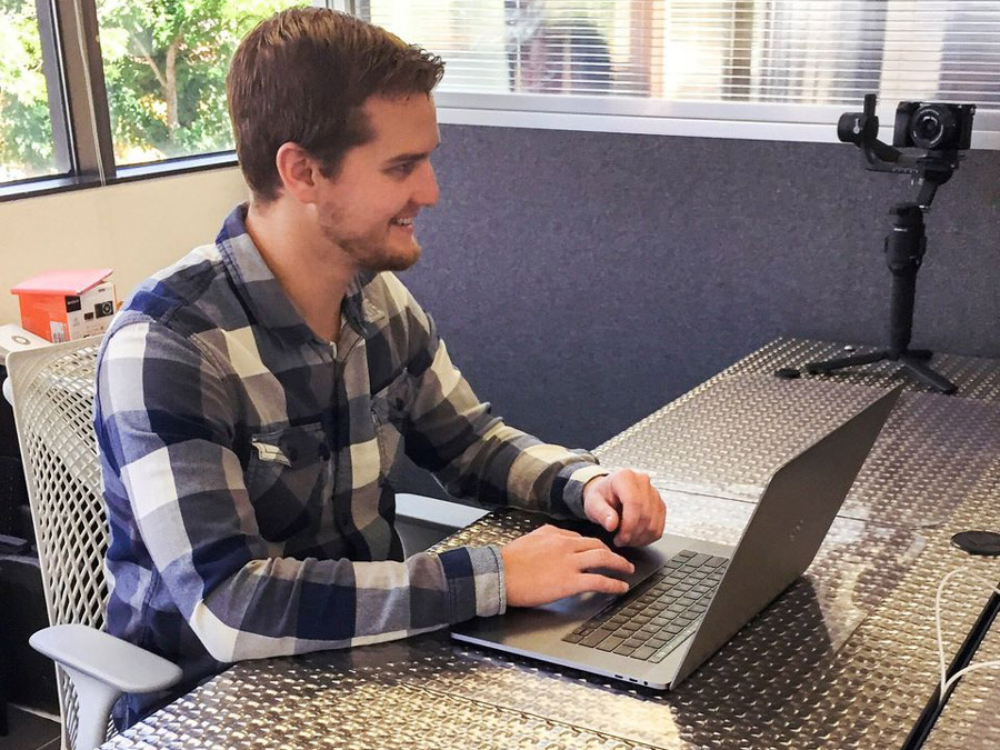 Matt Starrett working on a computer.