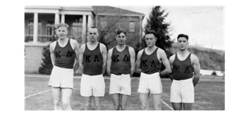 Univeristy of Nevada, Reno student-athletes are taking a break from their track and field practice to pose for a photograph on the site of the old stadium and training grounds.