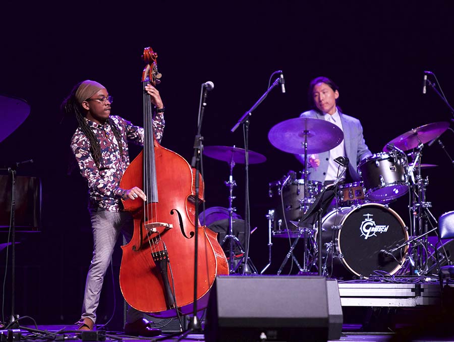 Two Reno Jazz Festival musicians perform on stage.