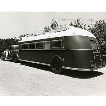 view of the left side of the Buick pilot car and trailer