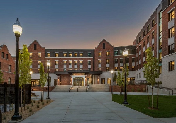 The front entrance of Great Basin Hall at dusk with Lincoln Hall to the left