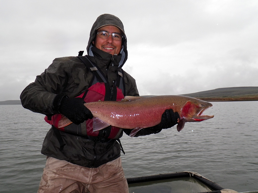 James Simmons holds a Lahontan Cutthroat Trout at Summit Lake